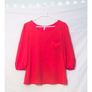 Point 3/4 Sleeve Open-Back Front Pocket Blouse